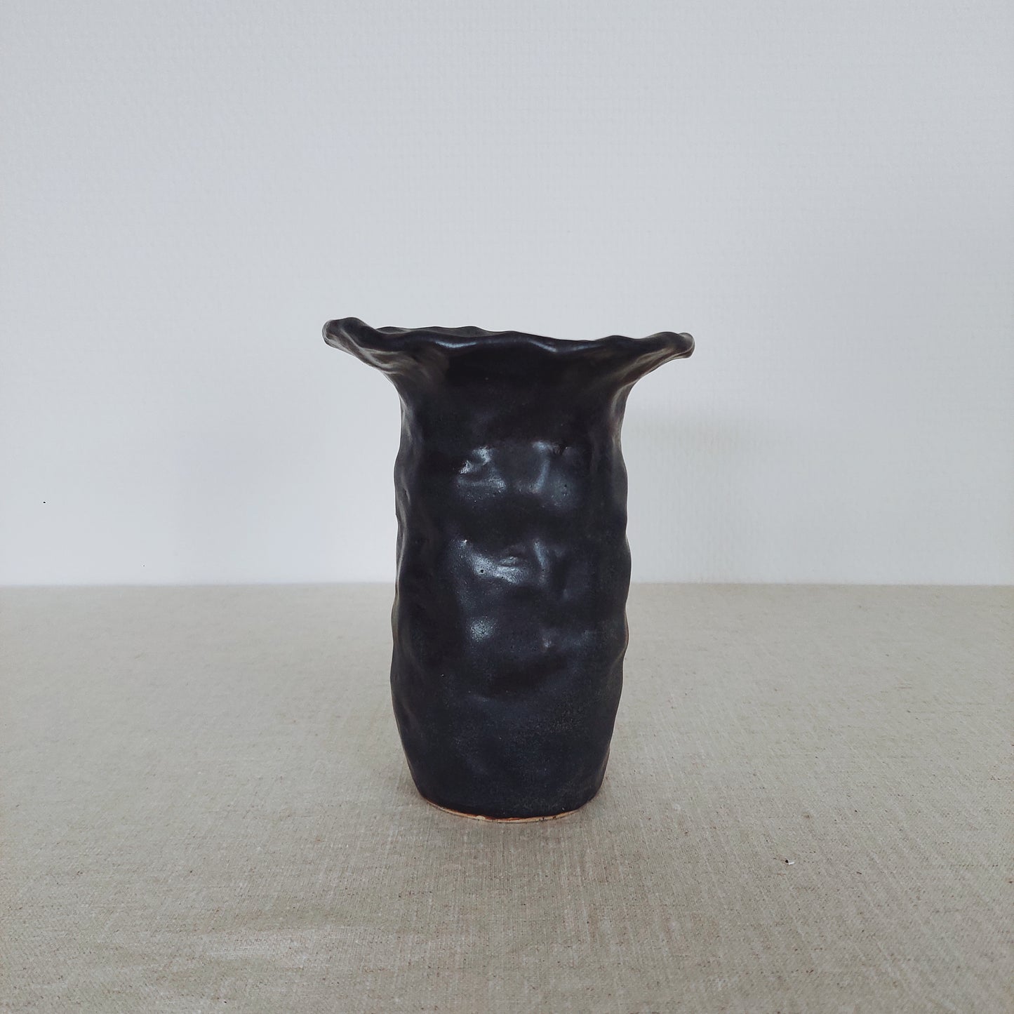 Small textured black vase