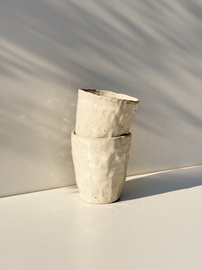 Tasse « pincée »