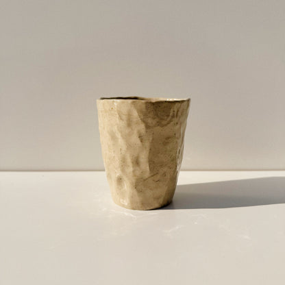 Tasse « pincée »