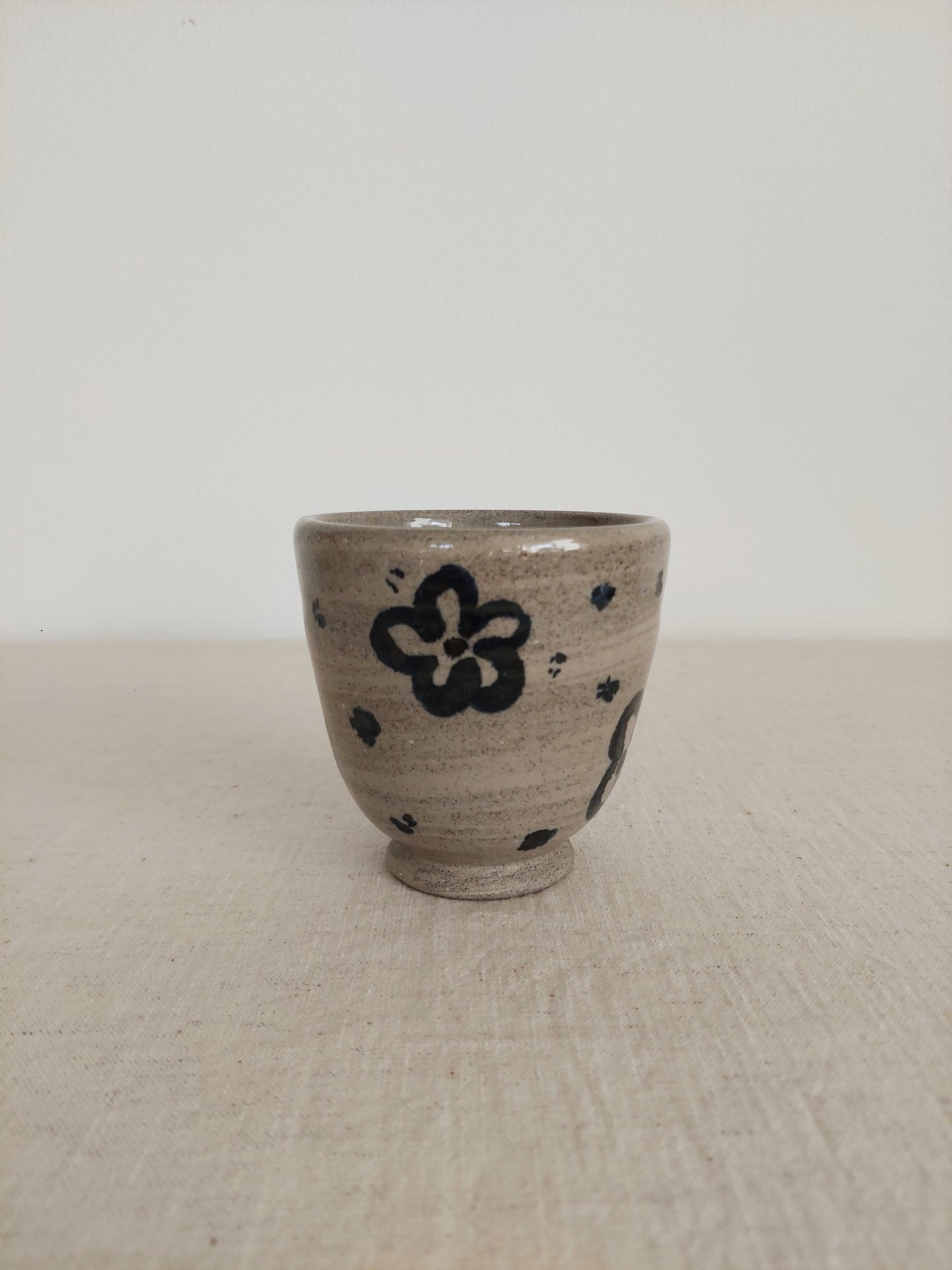 Grey Tea Cup (blue flowers)